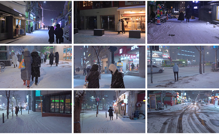 城市街道雪景下雪天夜晚街头人流车流冬天冬季雪花走拍短视频素材