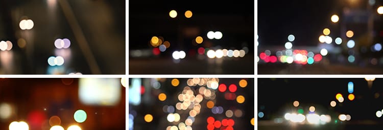城市夜晚夜景街道路交通汽车流车灯模糊光斑光晕闪烁实拍视频素材