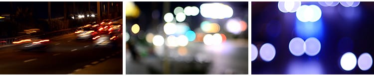 城市夜晚夜景街道路交通汽车流车灯模糊光斑光晕闪烁实拍视频素材