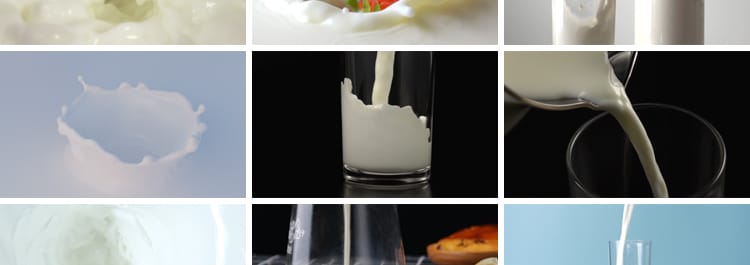 特写牛奶乳制品泼飞滴落溅起升高慢镜头摆拍鲜奶液体高清视频素材