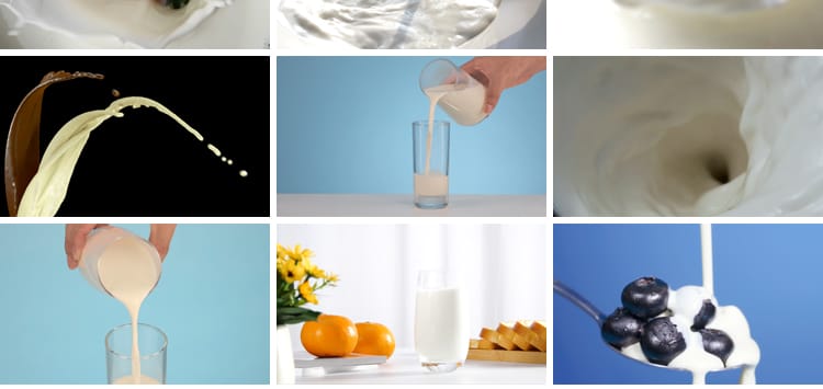 特写牛奶乳制品泼飞滴落溅起升高慢镜头摆拍鲜奶液体高清视频素材